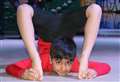 Ten-year-old yoga star puts on free lessons