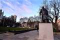 Churchill statue uncovered ahead of French president’s visit