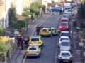 Armed police seal off road