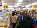 Queues 20 deep for Woolies closing down sale