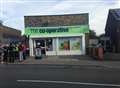 Five charged over shop raid