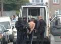 Armed police in siege drama