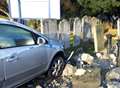 VIDEO: Car smashes into graveyard