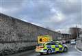 Police close town centre road after crash