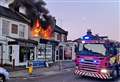 Man arrested after fire engulfs shop