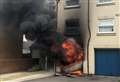 Garage flames spread to house