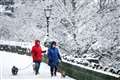 In Pictures: Britons and their pets brave the elements as snow covers part of UK