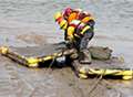 Firefighters test rescue skills on mud