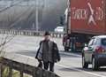 Smartly dressed commuter takes stroll on M20