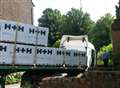 Lorry gets wedged in between buildings