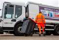 Bin strikes to go on for another month