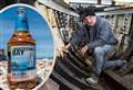 Painstaking restoration of 114-year-old boat resembling beer logo