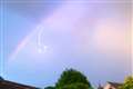 ‘Quite a spectacle’ as rainbows and lightning coincide