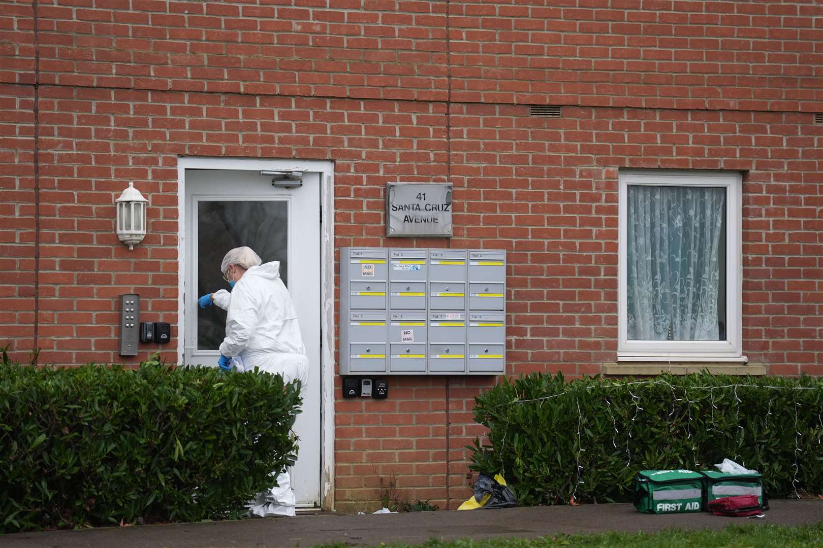 A forensics officer at the scene (Joe Giddens/PA)