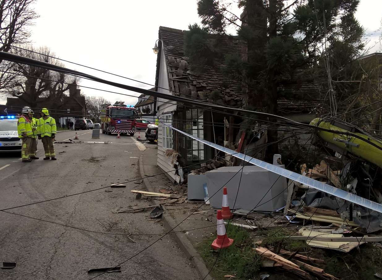 Engineers are on their way to assess damage to a phone box, telegraph pole and grade 2 listed building. Picture: KFRS