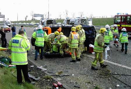 Emergency services work to help trapped people at the scene. Picture courtesy KENT AIR AMBULANCE TRUST