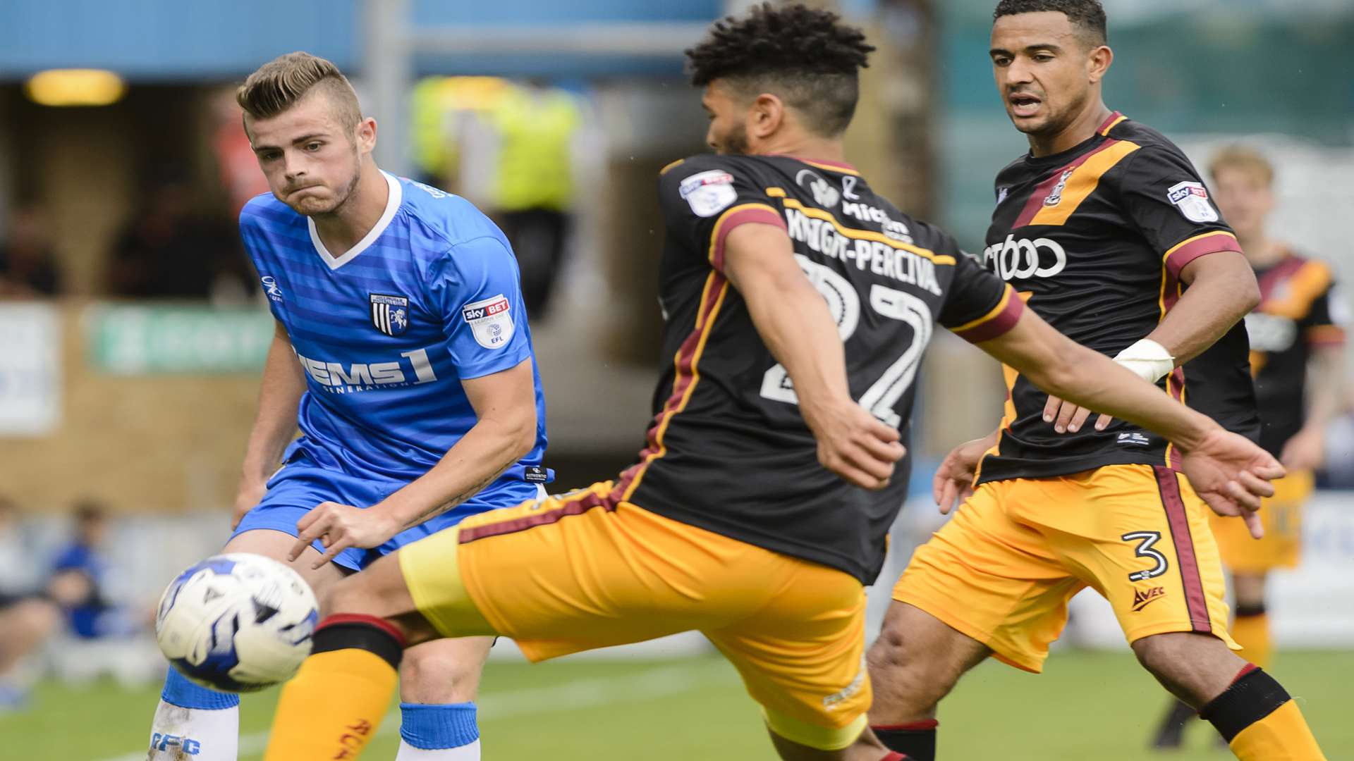 Striker Rory Donnelly challenged by Nathaniel Knight-Percival Picture: Andy Payton