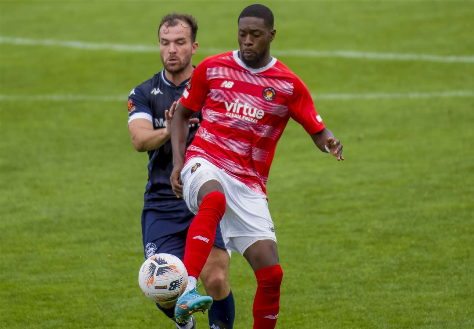 Dover's Mitch Brundle up against Ebbsfleet forward Rakish Bingham earlier this season. Picture: Ed Miller/EUFC