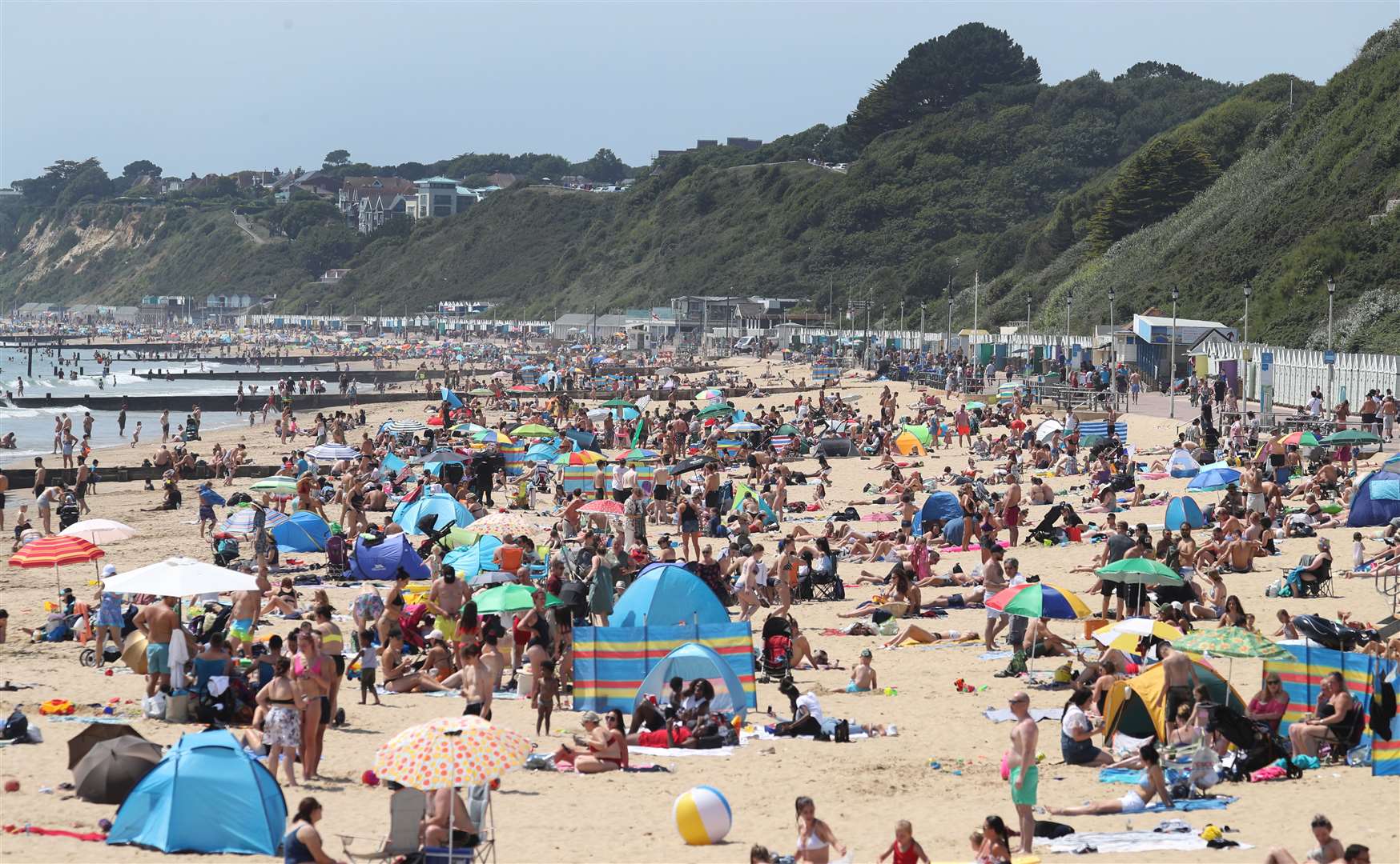 Crowds on Bournemouth beach during the warm weather this summer (Andrew Matthews/PA)