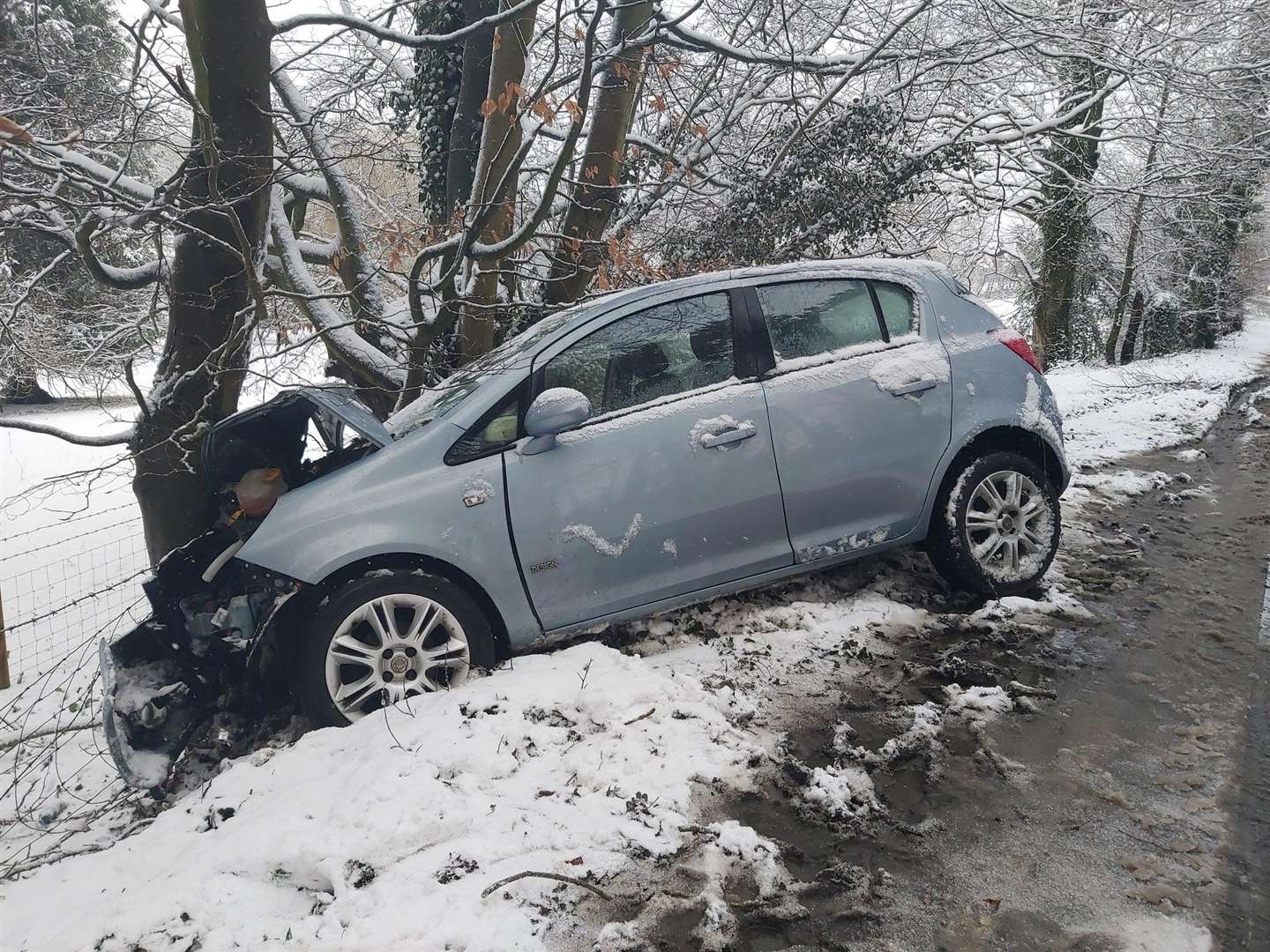 A car crashed on the Alkham Valley Road near Dover. Picture: @kentpolicedover / Twitter