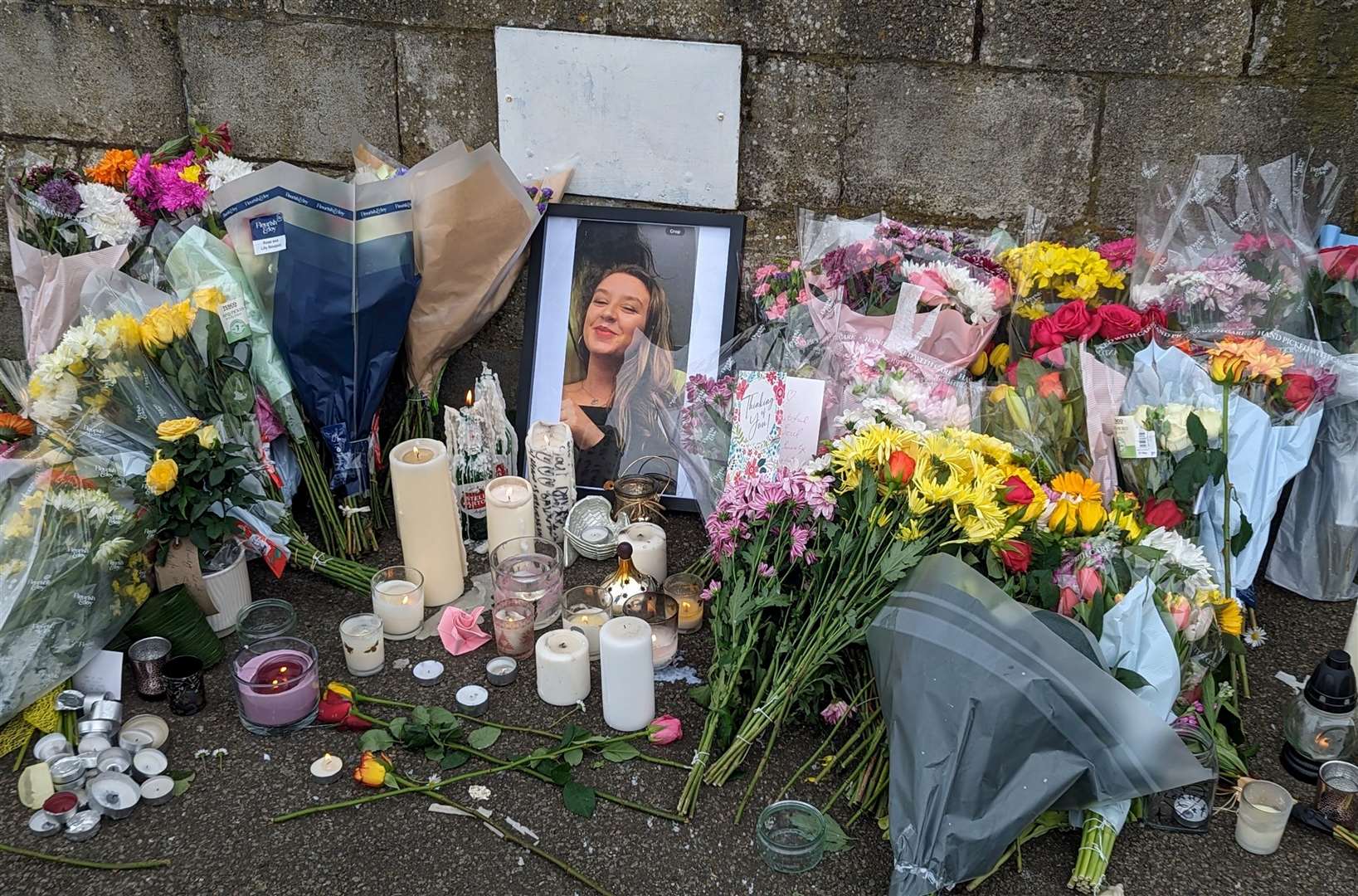 Tributes to Leah Daley left at the bandstand on The Leas in Folkestone following the discovery of a body in the search for the missing 24-year-old