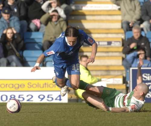Adam Miller is brought down by Yeovil's Tony Barry. Picture: GRANT FALVEY
