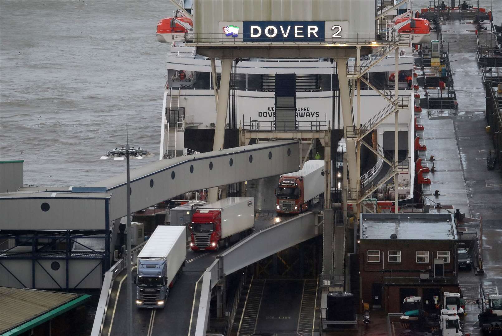 Lorries board a ferry at Dover bound for France (Gareth Fuller/PA)