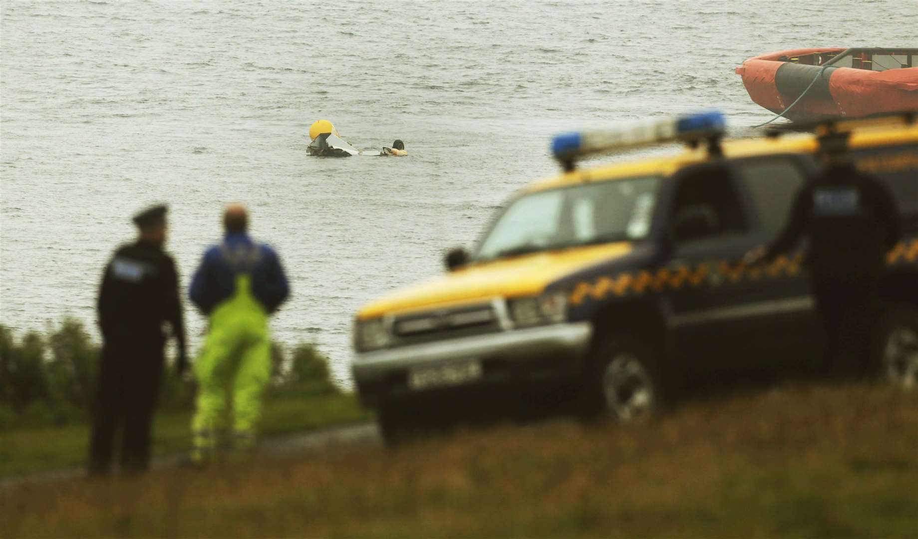 The wreckage of the Super Puma L2 helicopter during recovery attempts (Danny Lawson/PA)