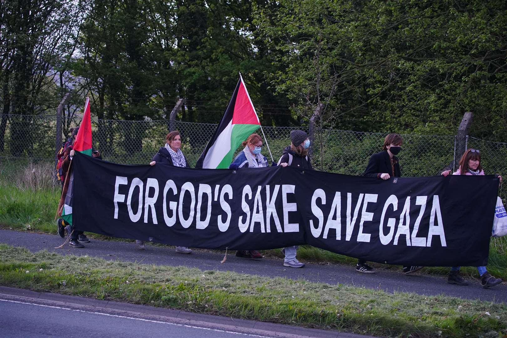 Protesters form a blockade outside weapons manufacturer BAE Systems in Samlesbury (Peter Byrne/PA)