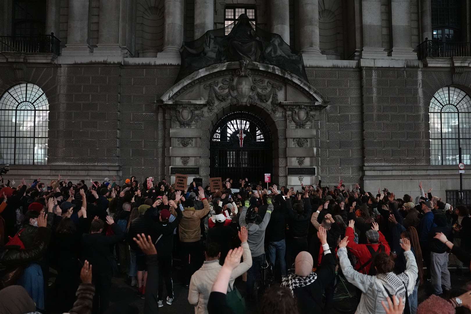 Friends and family of Chris Kaba were joined by more than 100 people outside of the Old Bailey where speakers demanded justice (Jordan Pettitt/PA)