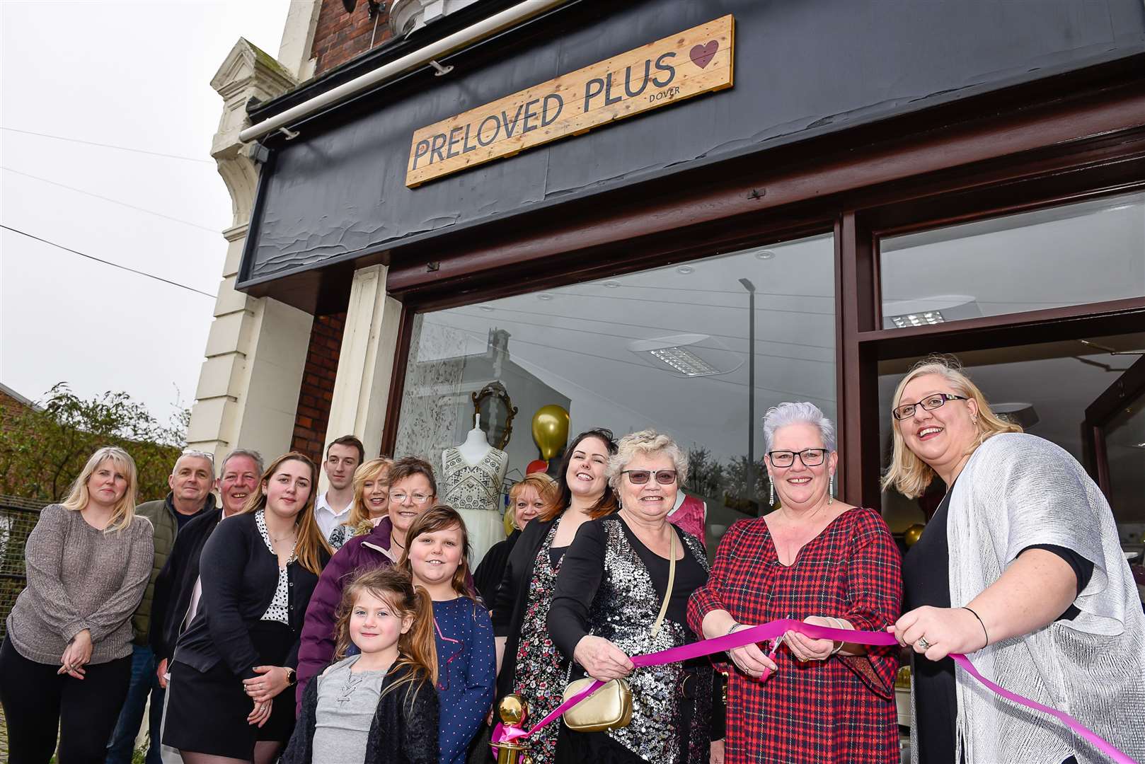 Mrs Hoskins with friends and customers at the opening ceremony on March 14, Picture: Alan Langley.