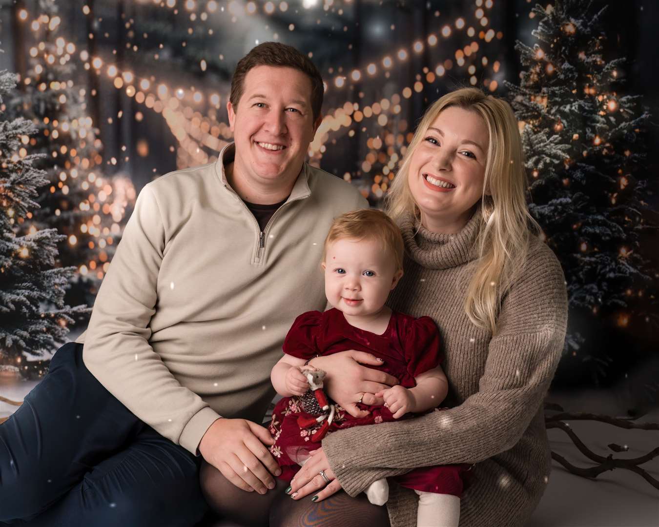 Aurora with her parents Sam and Laura Hudson (Jo Bishop Photography/PA)