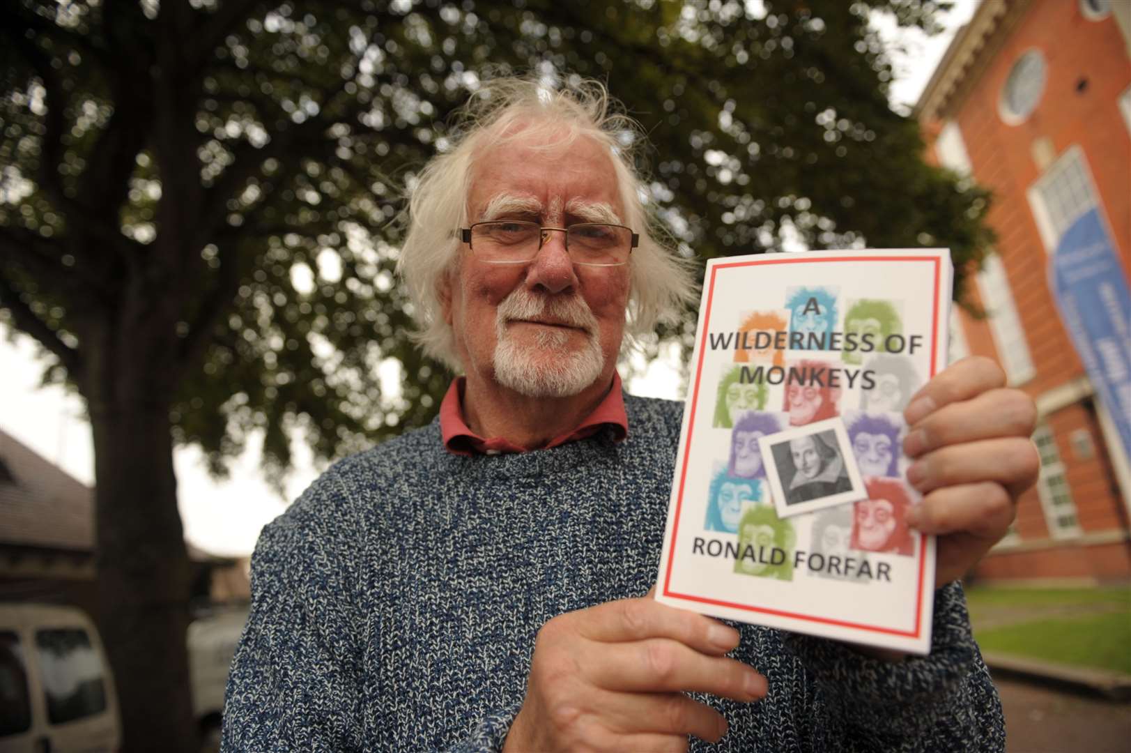 Rochester resident Ronald Forfar with his book