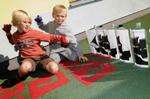 Daniel and Tyler, both 6, playing pirate ship skittles.