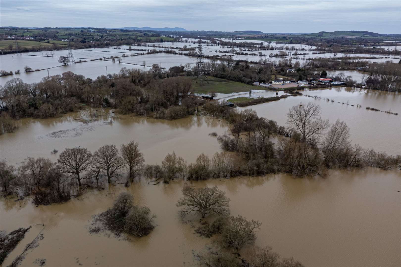 Fields saturated by flood water on the outskirts of Gloucester on Monday (Ben Birchall/PA)