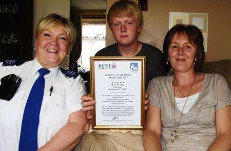 PCSO Brenda Keeble with Jack Palmer and his mum, Elaine