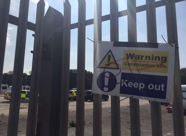 Police at the site of a travellers' camp in Rosherville Way, Northfleet