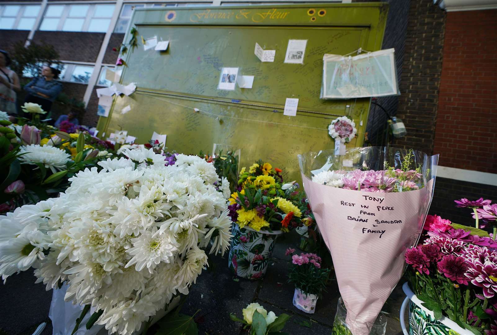 Tributes at a vigil for Tony Eastlake at his stall at Essex Road Station in London (Yui Mok/PA)