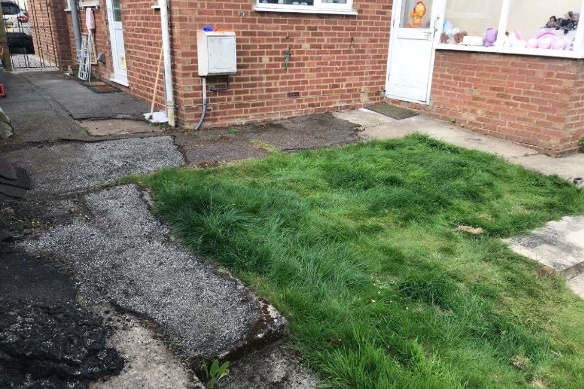 Martha has trouble navigating the garden's uneven paving. Pic: Roz Sissons (9958570)