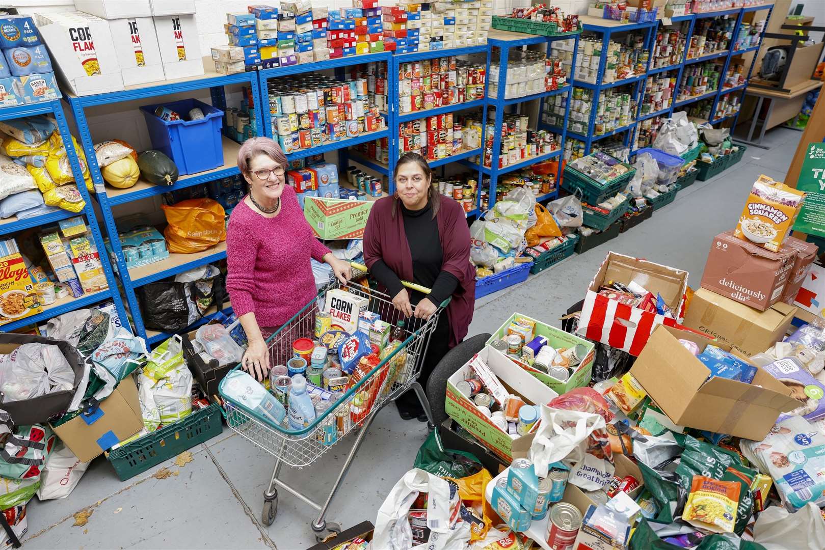 Esther Hurwood, Project Manager at Swale Foodbank, and a volunteer