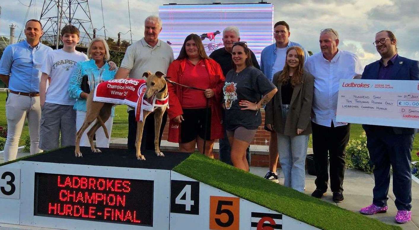 Barry O'Sullivan, fourth from left, celebrates victory with Nunhead Shiv in the Champion Hurdle final at Crayford last July. The Fawkham coach wants to enjoy that winning feeling at this year's Cesarewitch in Central Park. Image: Barry O'Sullivan