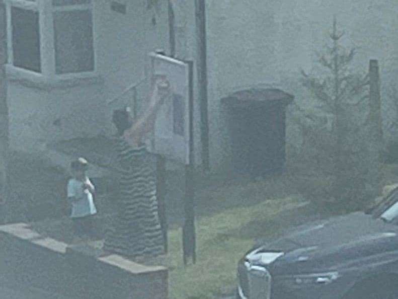 Elizabeth Kitchener, put a home-made 'Be Kind'; poster over the sign, which many felt was offensive