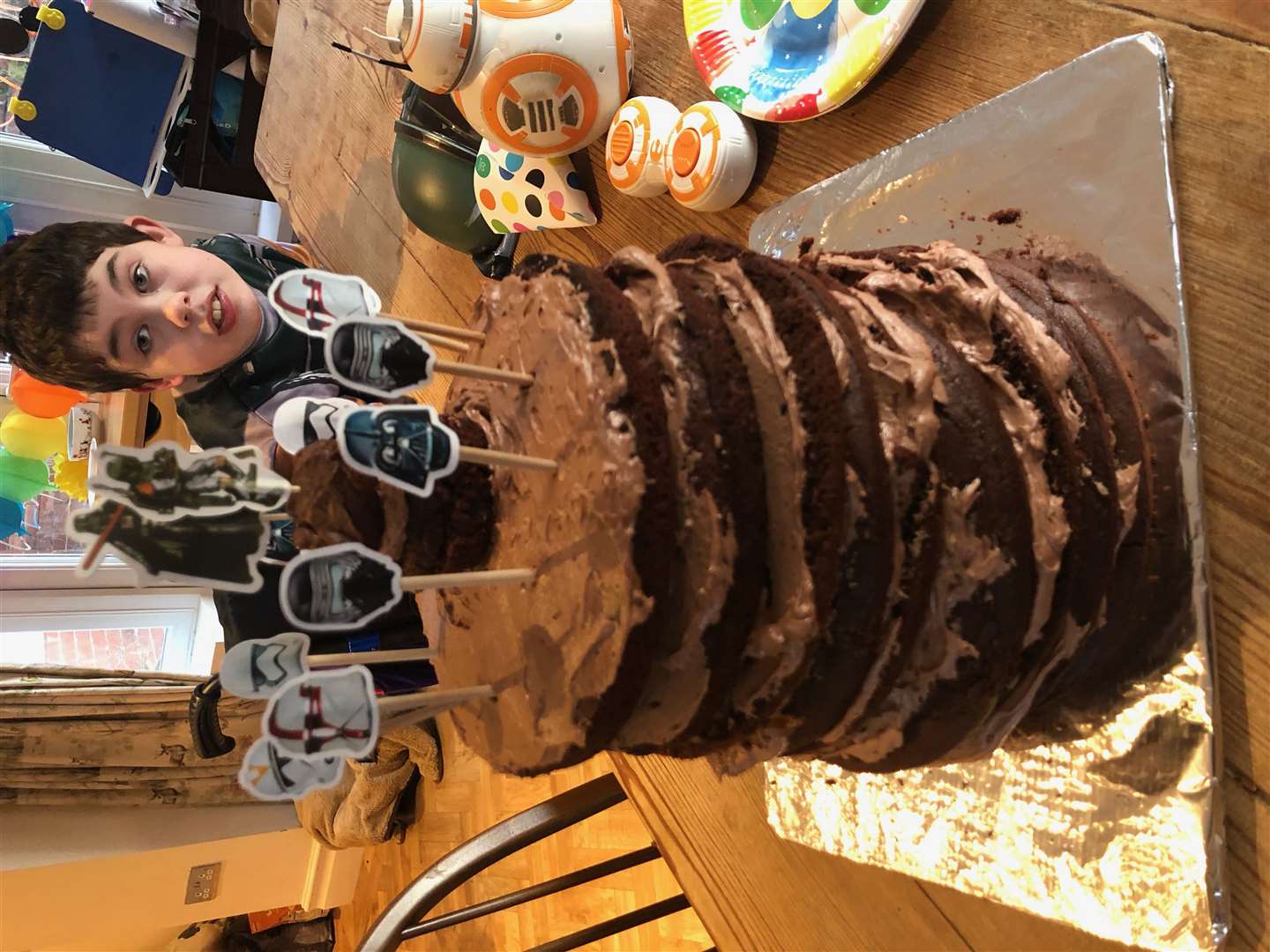 Oliver celebrated his 13th birthday with a 13-layer chocolate cake, and by raising £178,000 for charity (Family handout/PA)