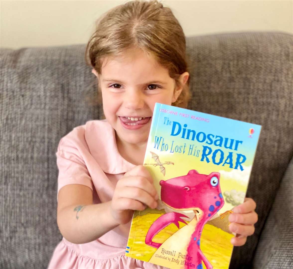 Children enjoyed discovering books that were in locations around Maidstone, four-year-old Molly is seen here with a book she found