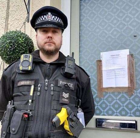 Police sergeant Steve Cole outside the closed-down property in Princes Road, Gravesend. Picture: Kent Police