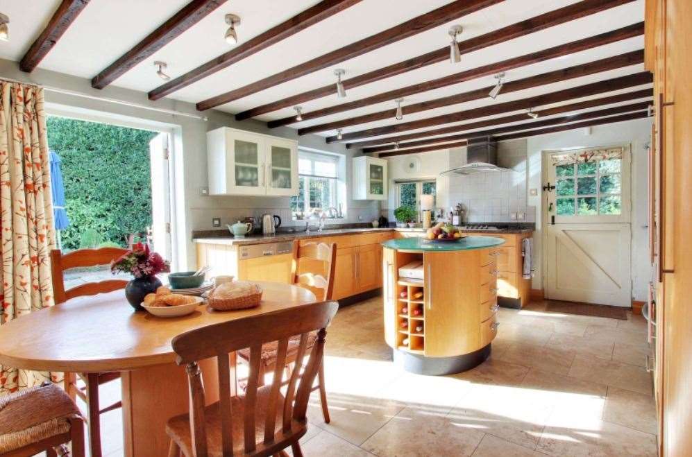 The kitchen and breakfast room has beautiful views of the garden. Picture: Savills
