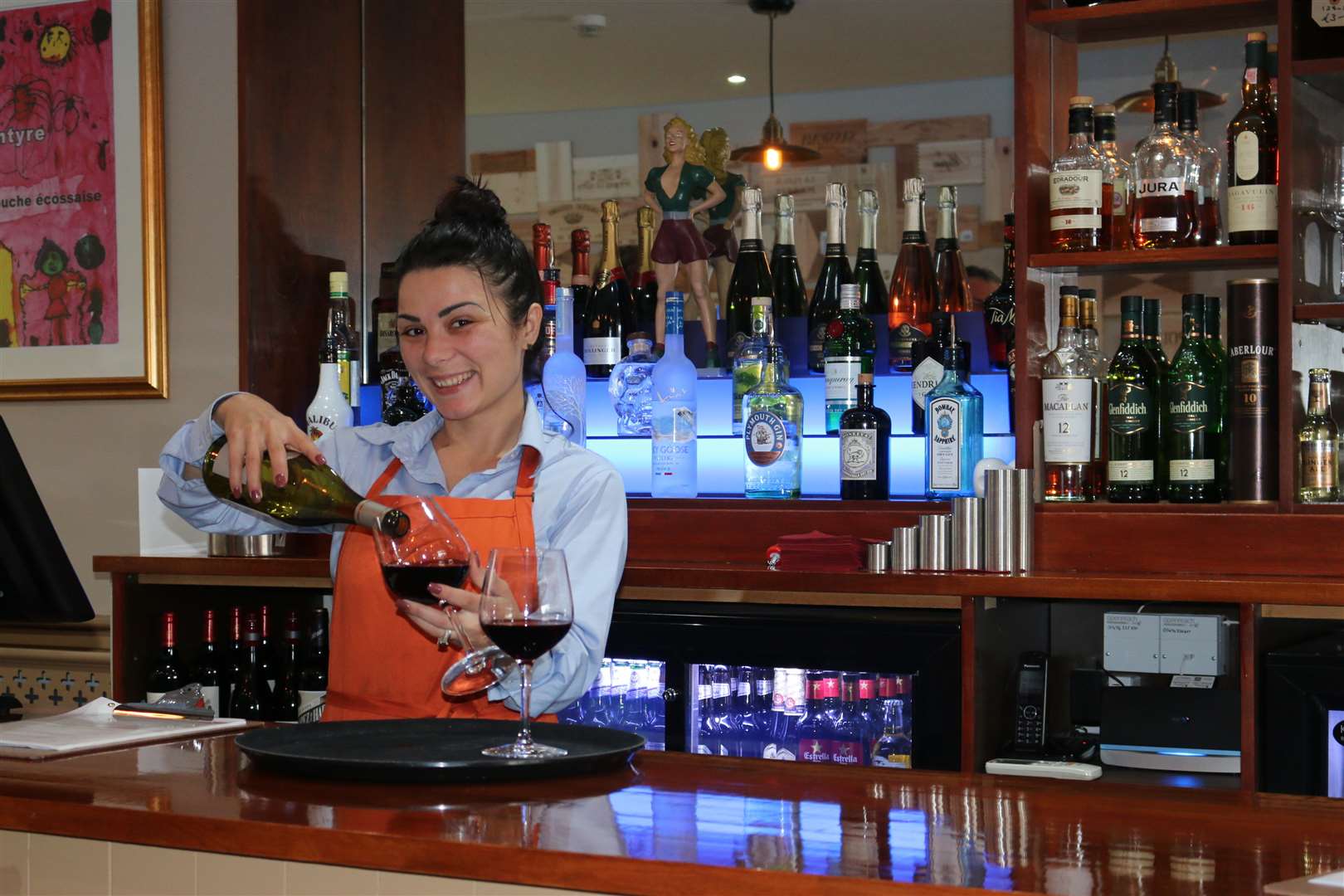 Jenny behind the bar