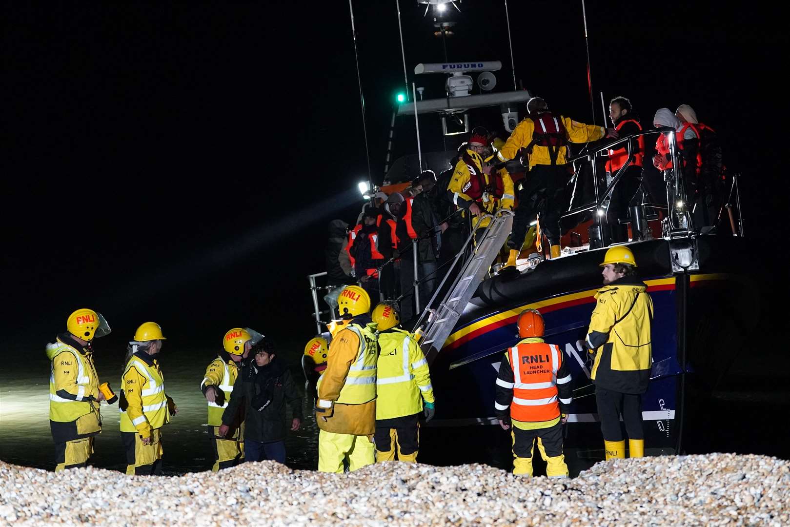 A group of people are brought in to Dungeness, Kent, (Gareth Fuller)