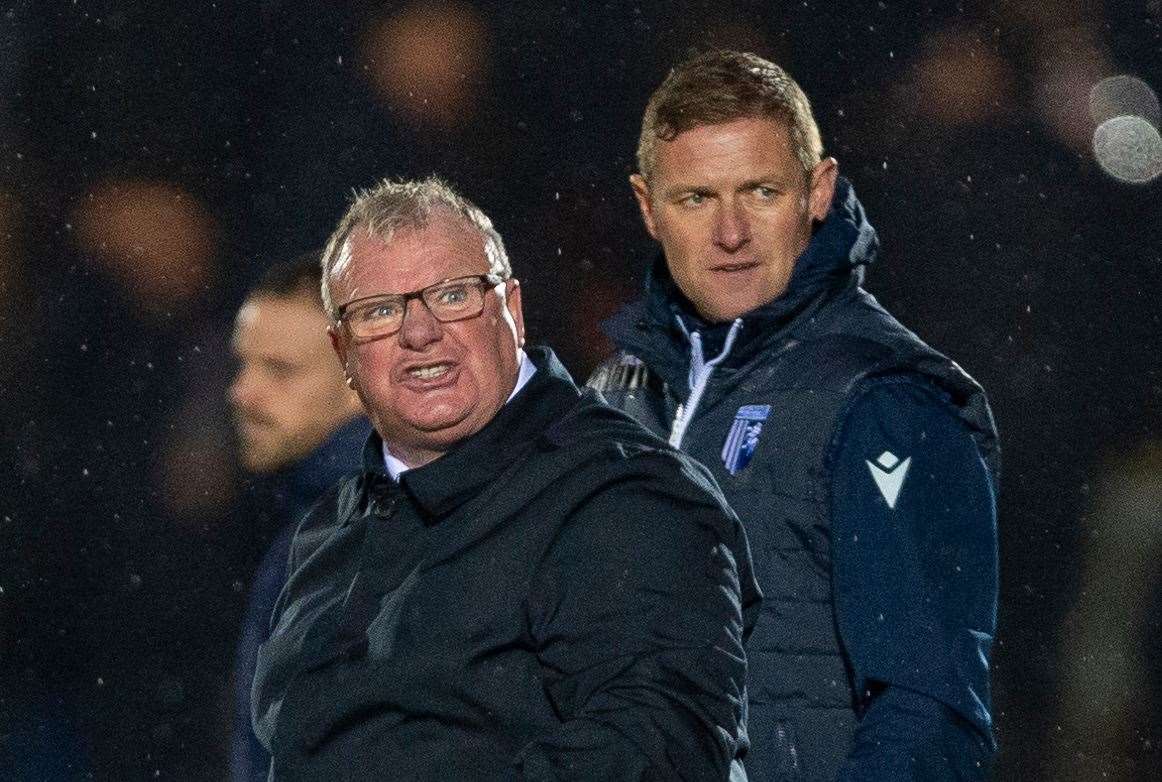 Gills manager Steve Evans directs his anger towards referee Kevin Johnson on the final whistle at AFC Wimbledon Picture: Ady Kerry