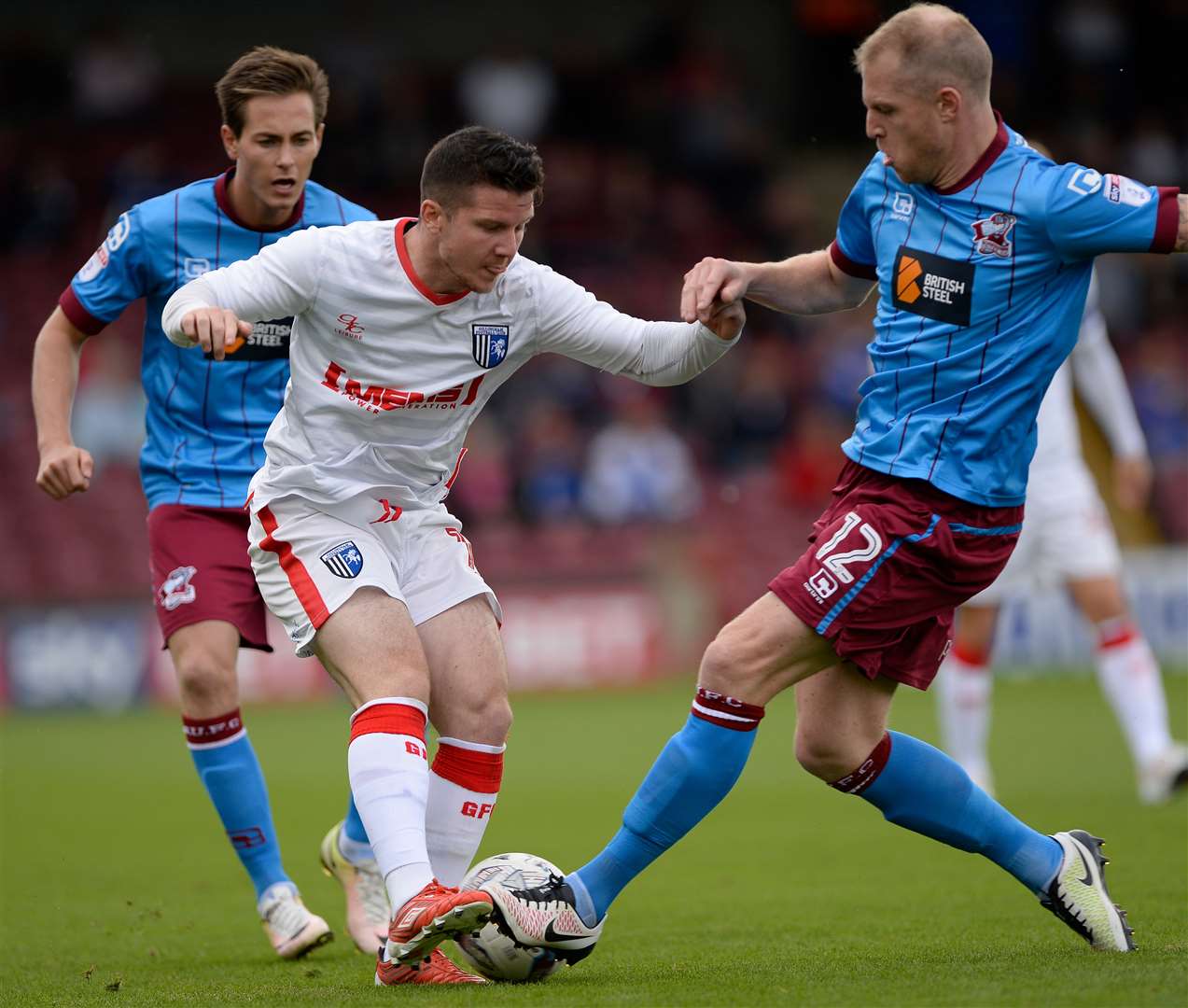 Gills midfielder Billy Knott in the thick of the action. Picture: Ady Kerry